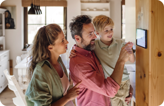 Family enjoying their smart home with tablet control